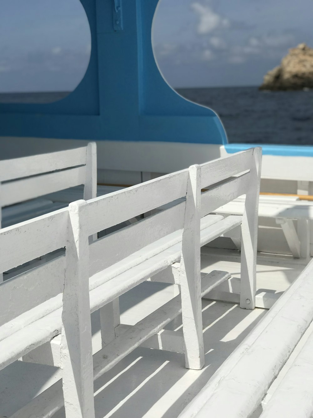white wooden bench in boat during daytime