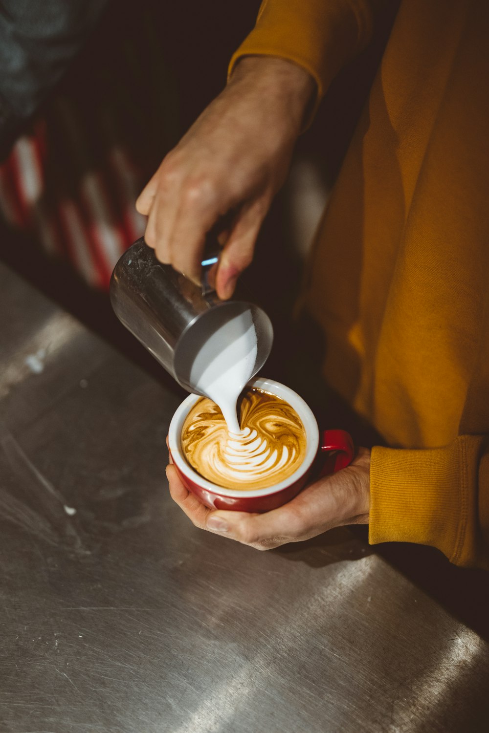 person preparing espresso