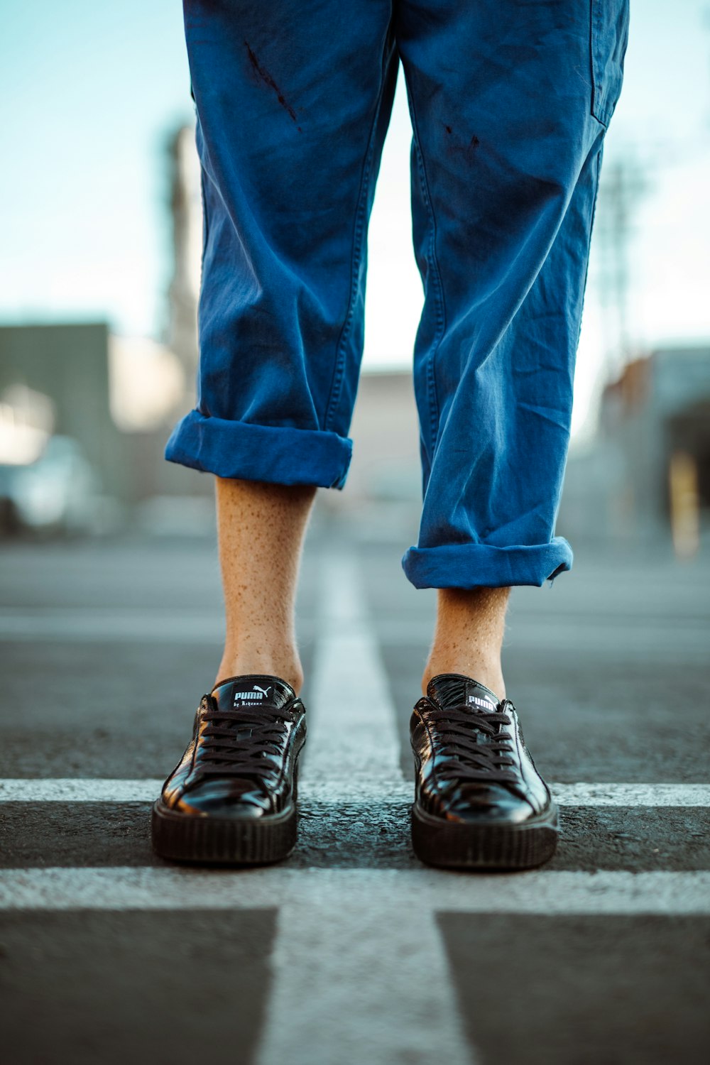 person wearing black sneakers