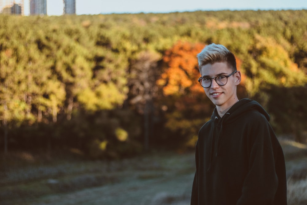 man wearing black pullover