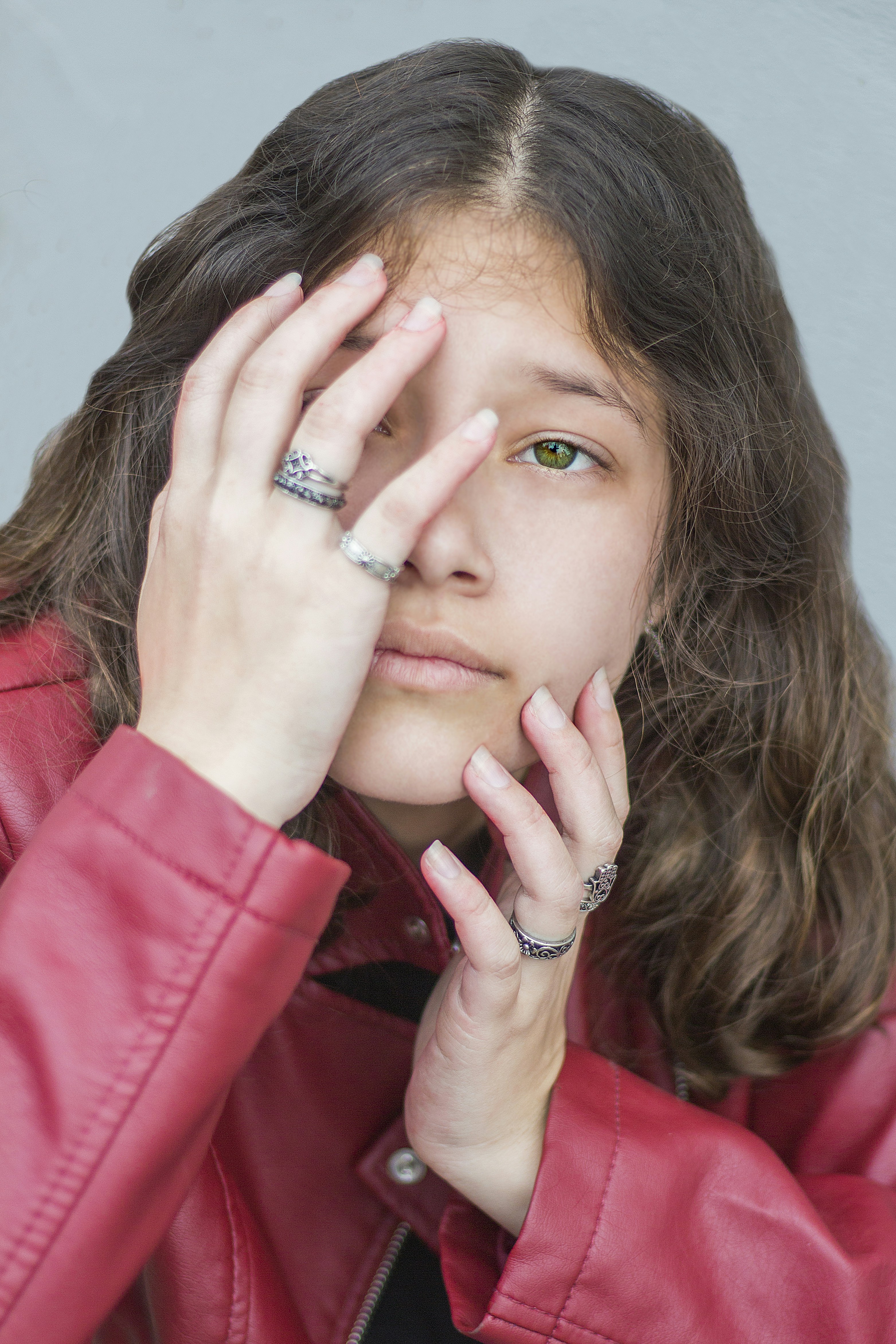 girl wearing red leather jacket