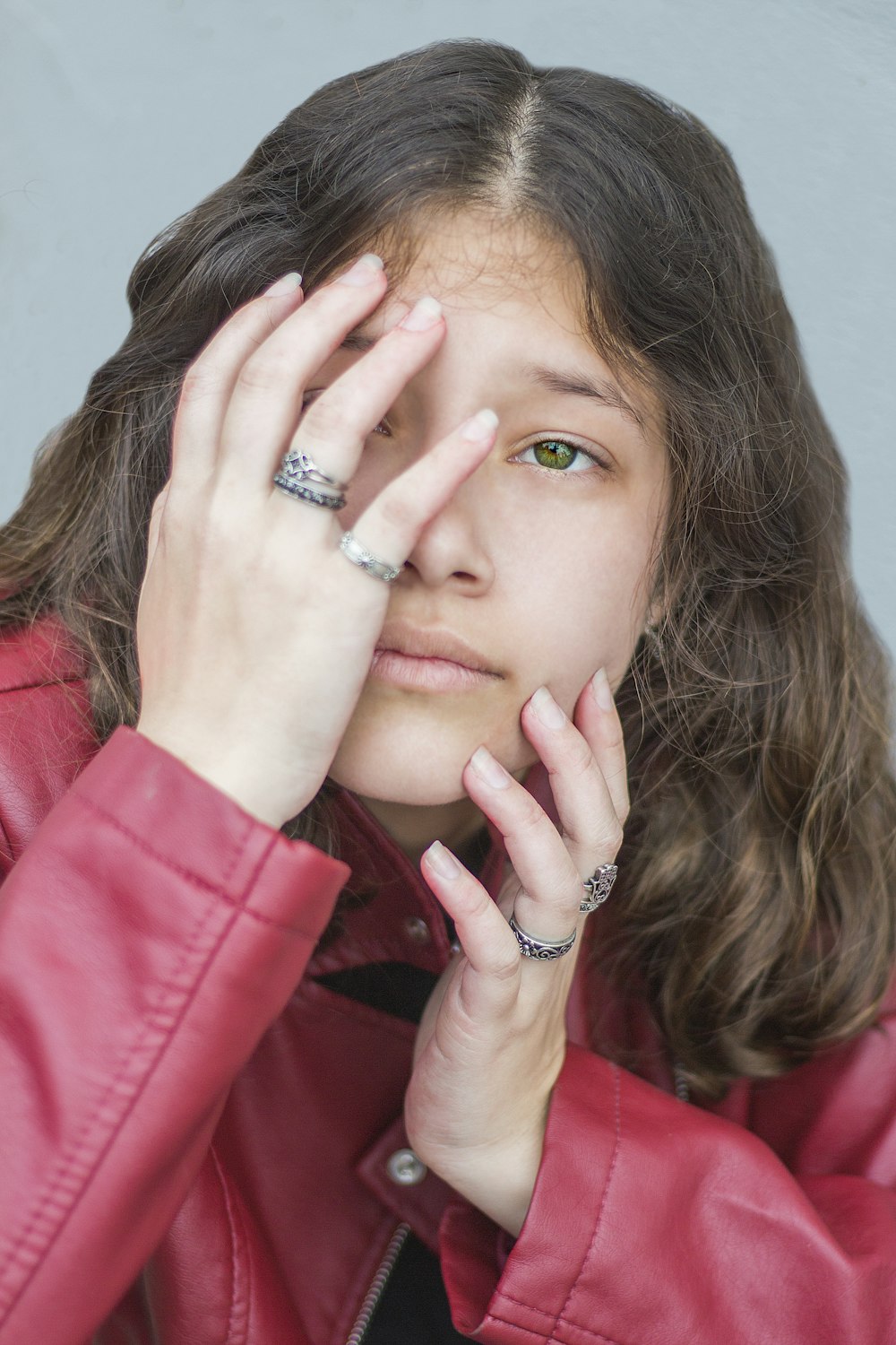 girl wearing red leather jacket