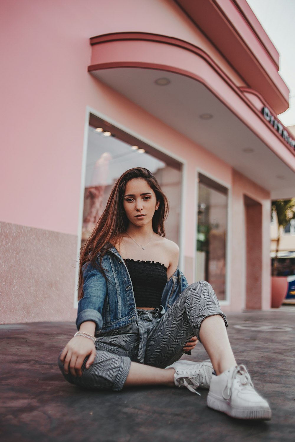 woman sitting on ground