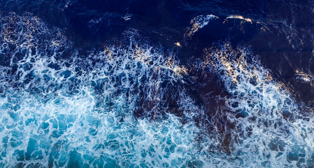 body of water during daytime top-view photography \