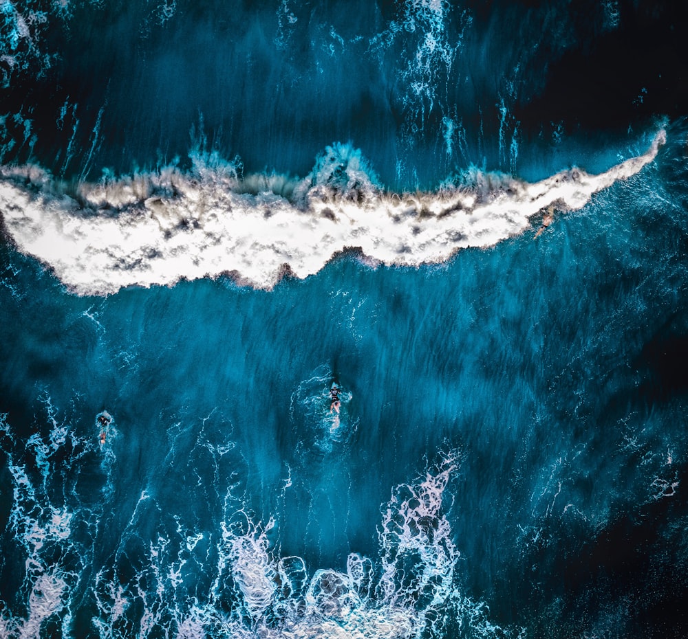aerial photography of blue waves