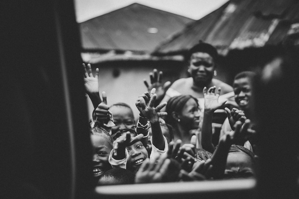 view of children outside vehicle