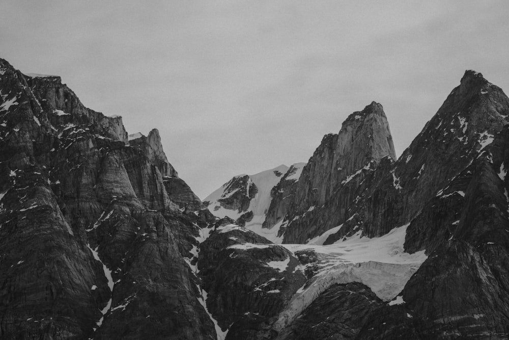 snow covered rock mountain