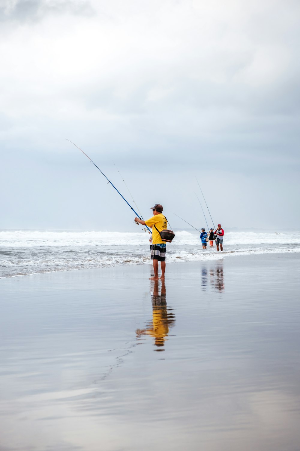 view of people fishing at the beach