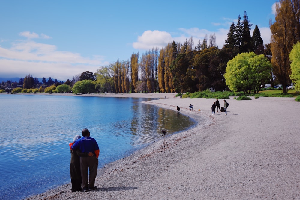 person taking picture using tripod