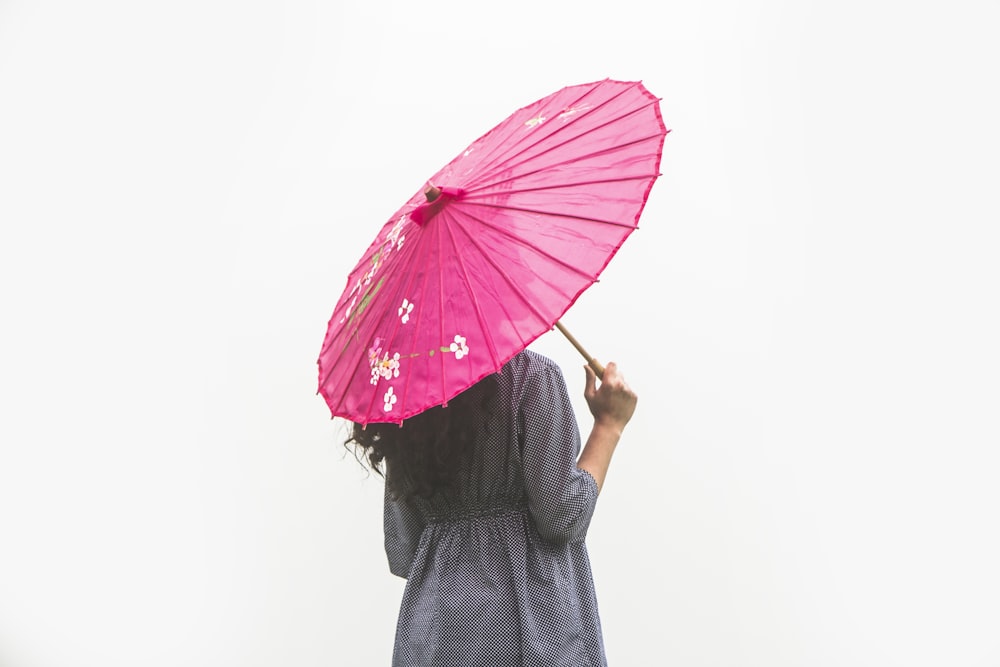 woman holding umbrella