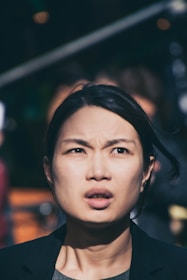 Close-up of a confused visitor browsing a cluttered and unclear landing page.