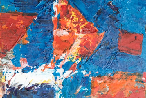 An abstract painting combining various bold colors and textures.