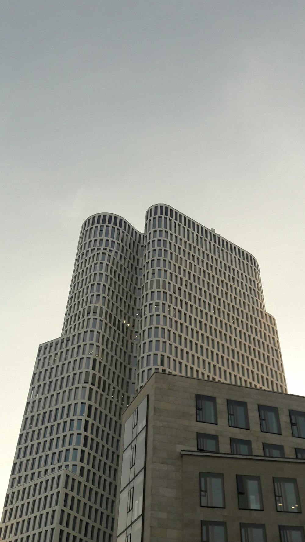 low angle photography of high rise building at daytime
