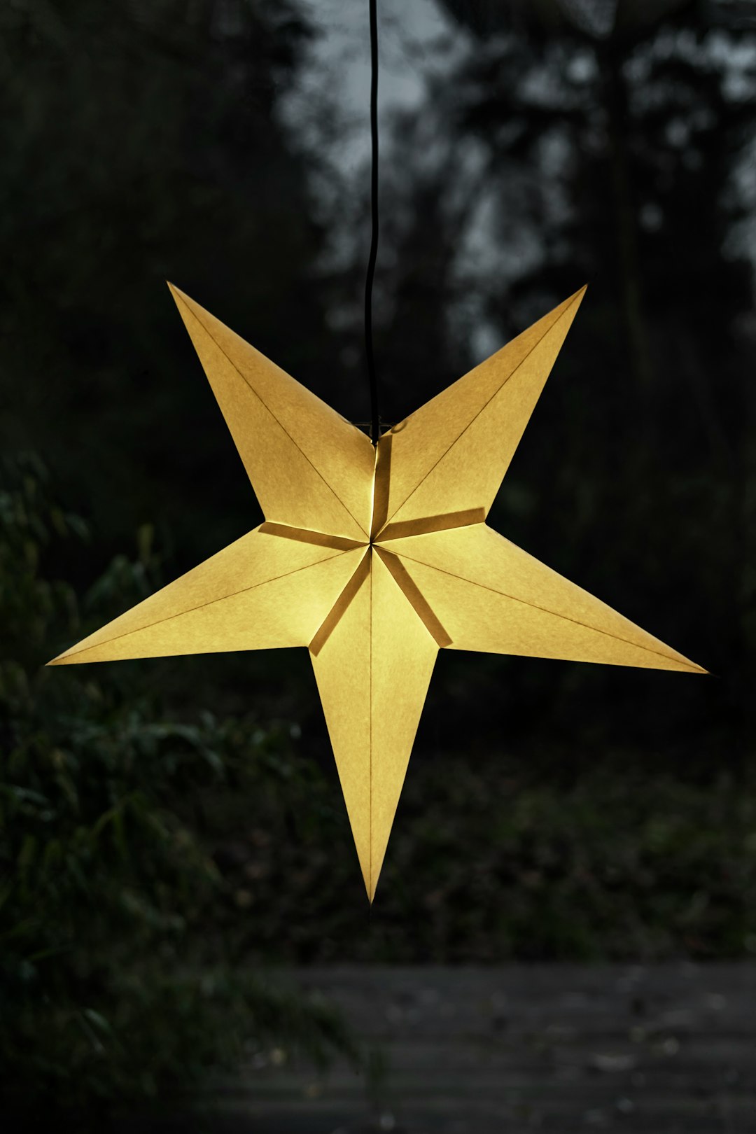 yellow star hanging decor with light