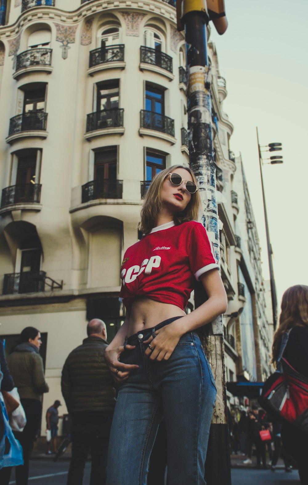 woman wearing red crop top