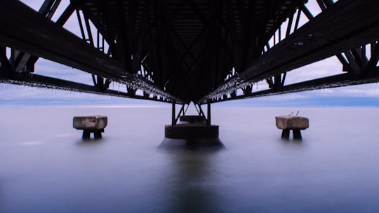 low-angle photography of black steel bridge in Lake Erie United States