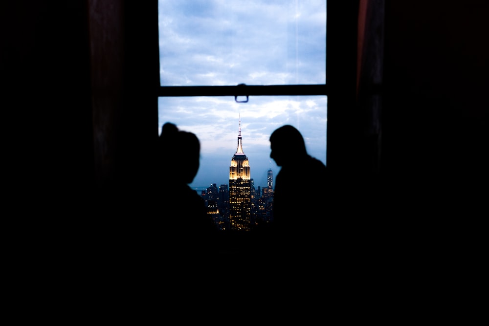 picture of couple in window