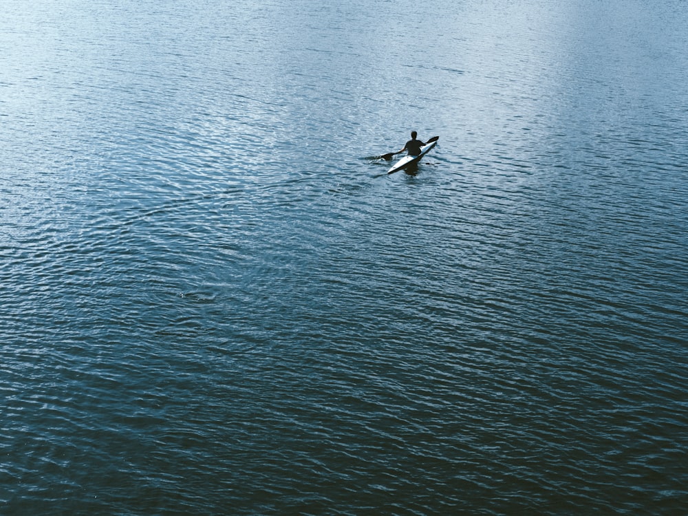 man sailing boat