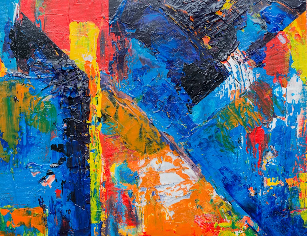 blue, black, and orange abstract painting