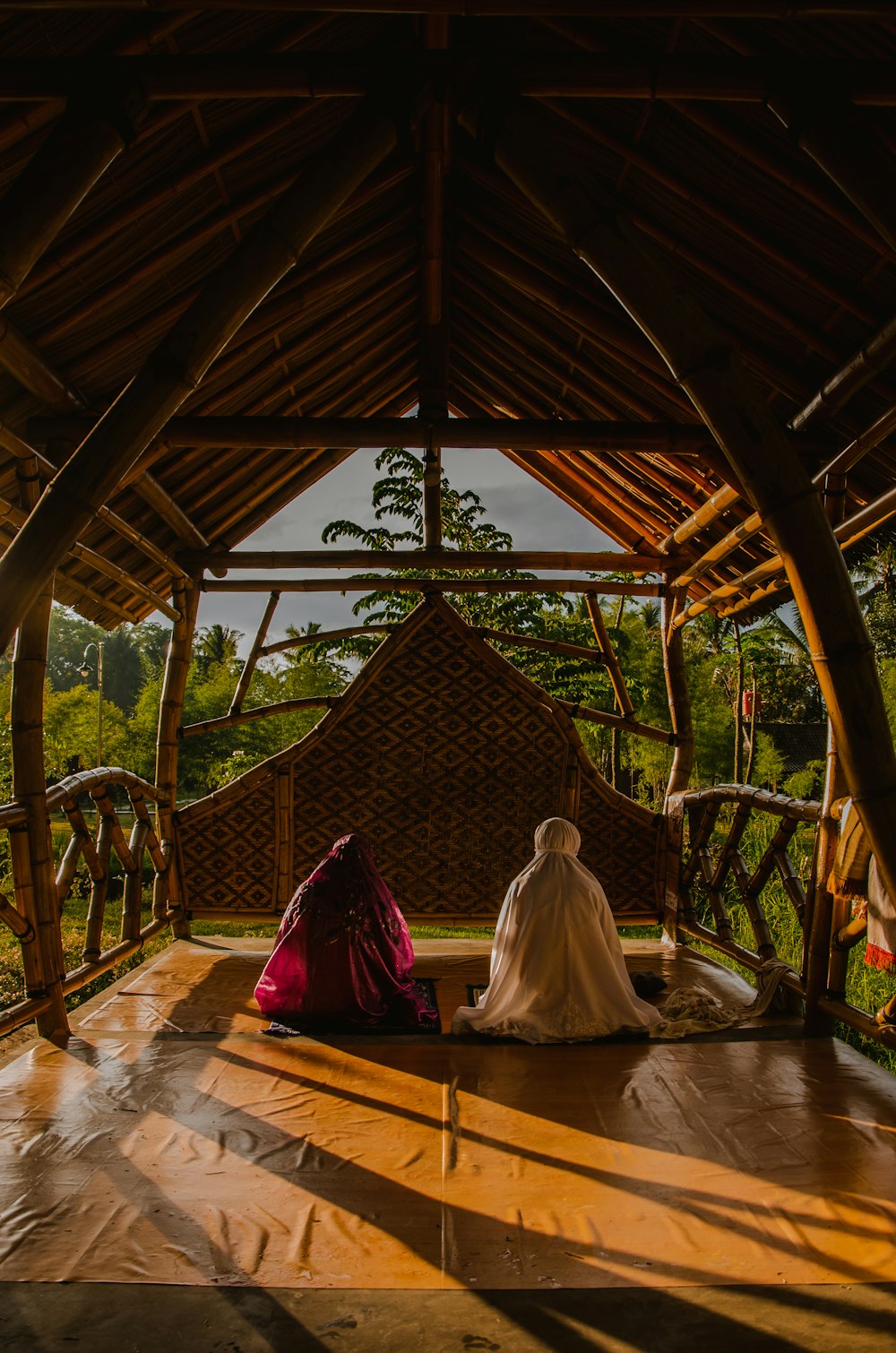 two person sits on floor