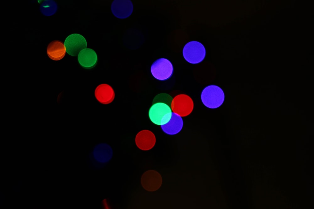 a blurry photo of colorful lights in the dark