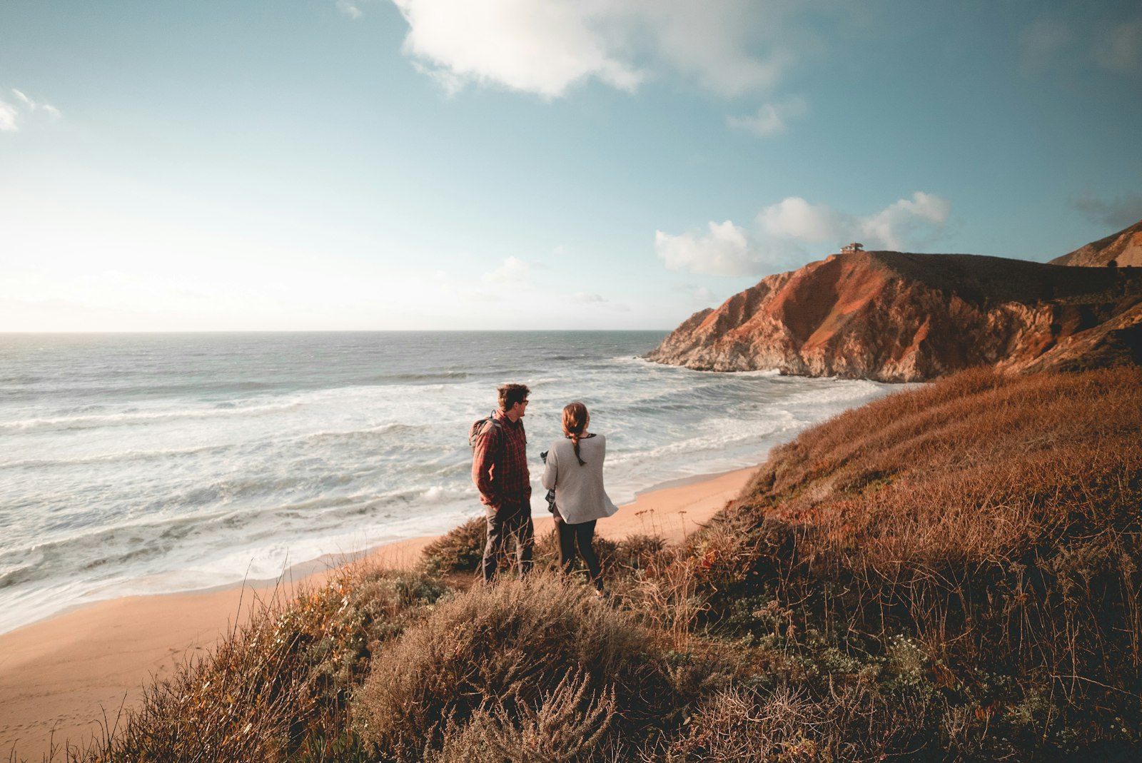 ZEISS Batis 18mm F2.8 sample photo. Man and woman standing photography