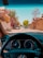 A view from the driver's seat inside a car, showing a residential street lined with walls and flowering trees, including palm trees and bougainvillea. The dashboard and steering wheel are visible in the foreground, while several parked cars and a bright sky can be seen outside.
