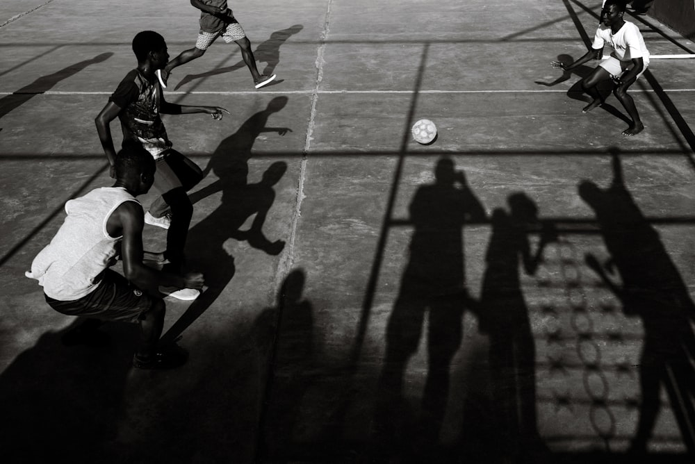 group of men playing soccer