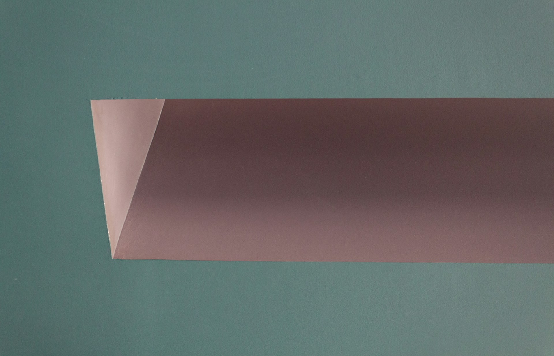 a close up of a piece of pink paper