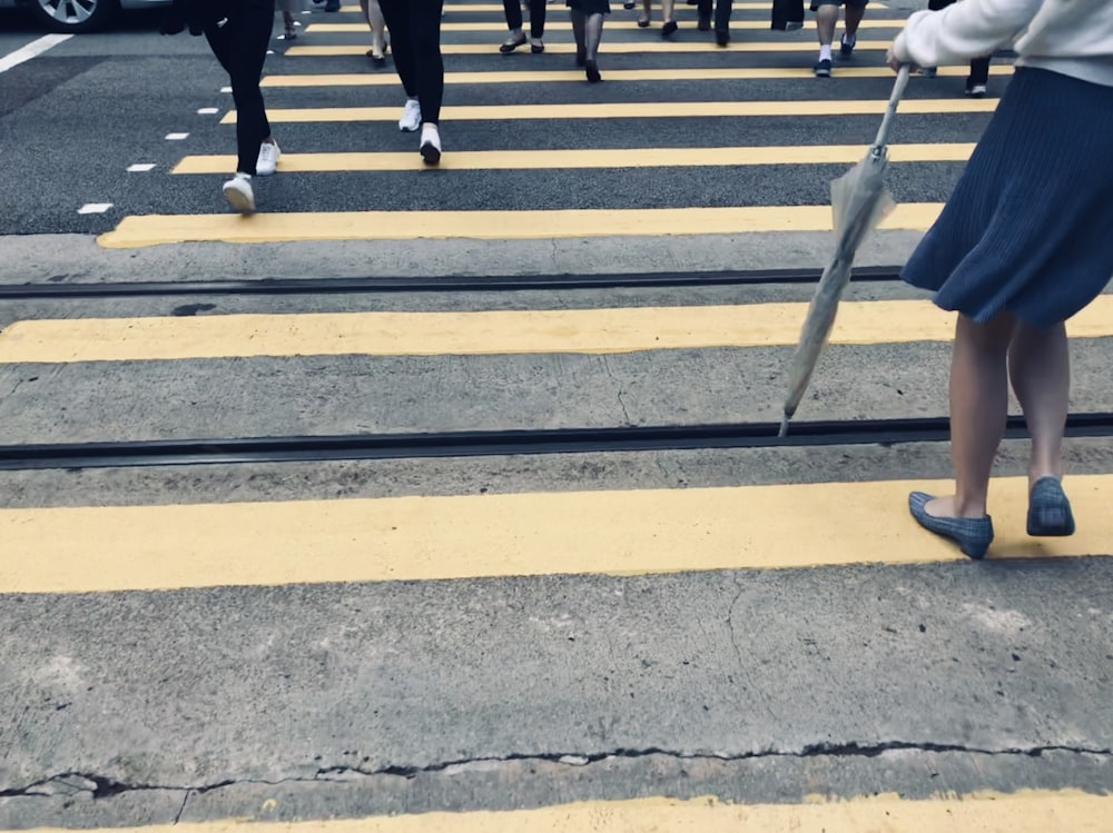 people walking on pedestrian lane during daytime