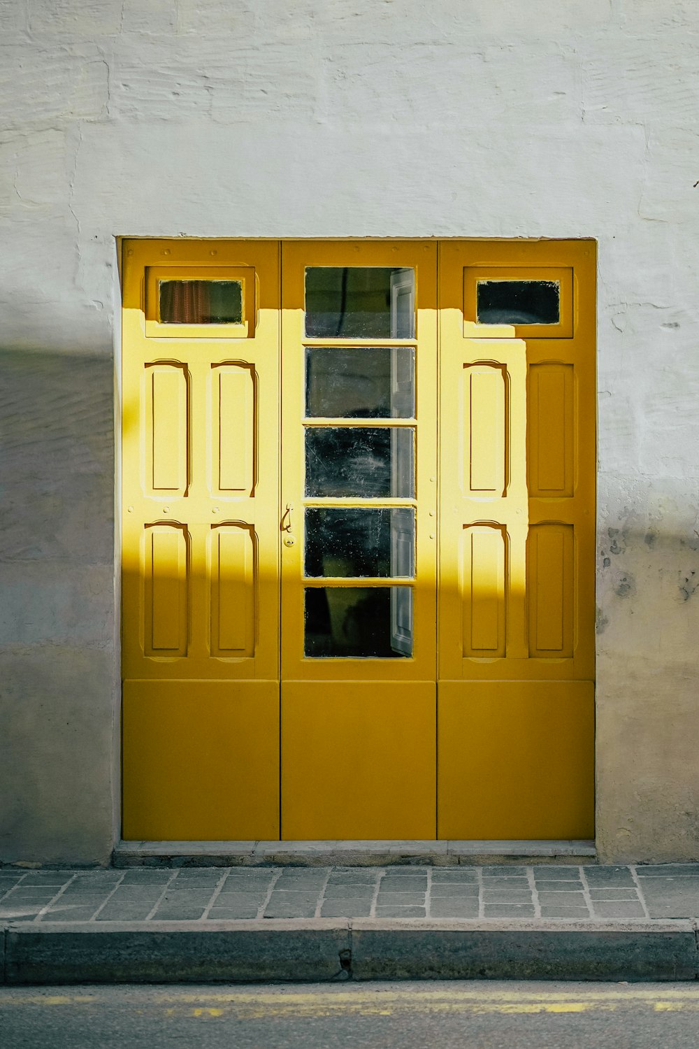 brown wooden framed glass door