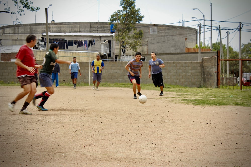 group of men playing soccer