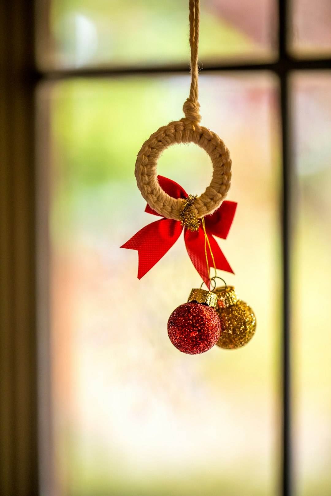 two red and yellow christmas baubles