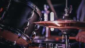 man playing on drums