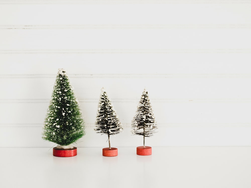 three green christmas tree decors