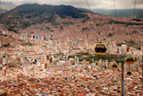 four running cable cars during daytime