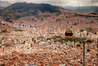 four running cable cars during daytime