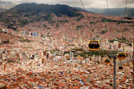 four running cable cars during daytime