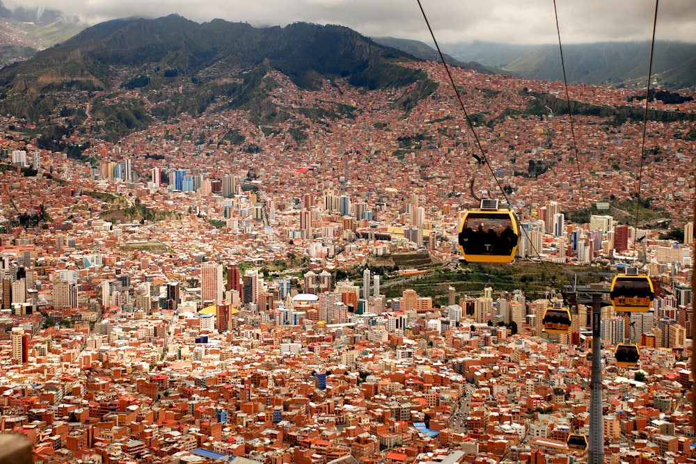 four running cable cars during daytime