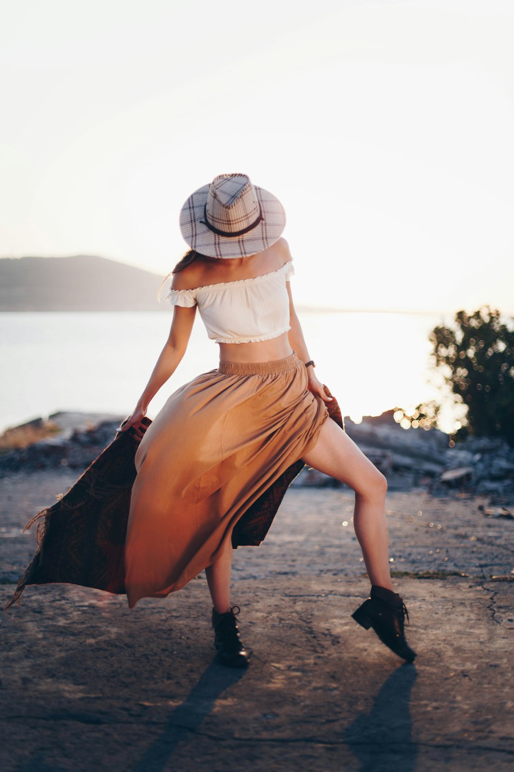 woman wearing white crop-top during daytime