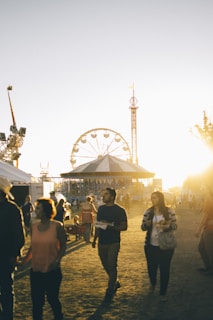 group of people walking on amusement park