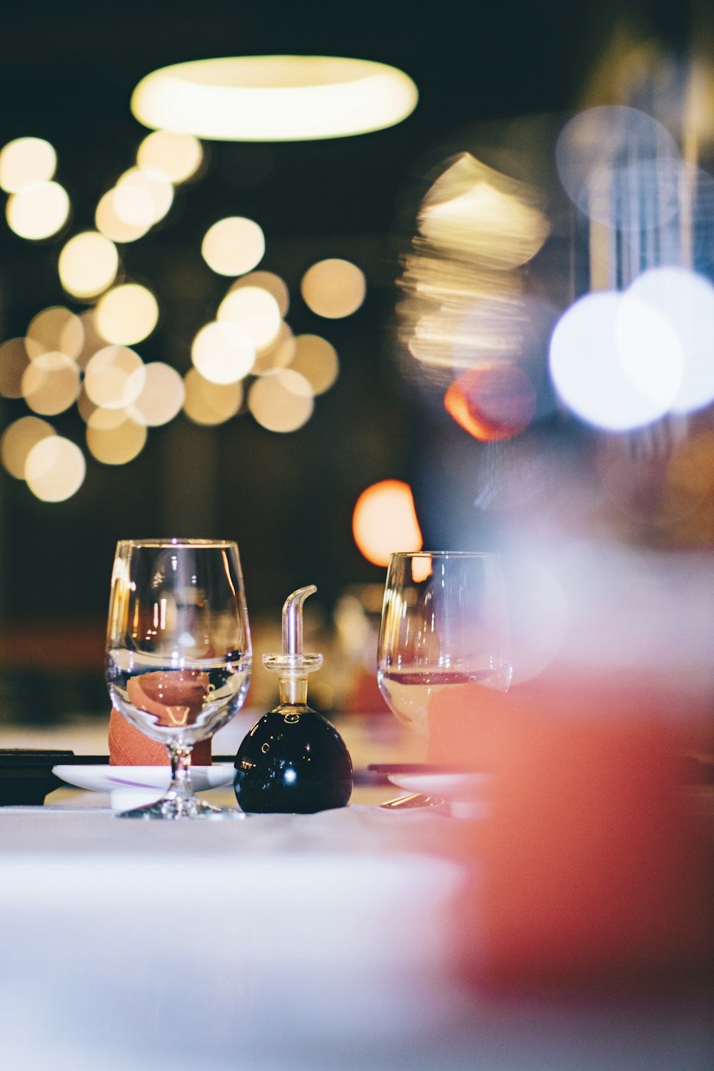 selective focus photography of wine glasses