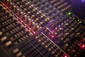 selective focus photography of audio mixer
