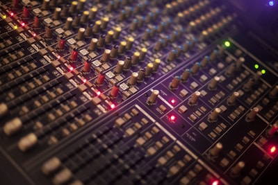selective focus photography of audio mixer