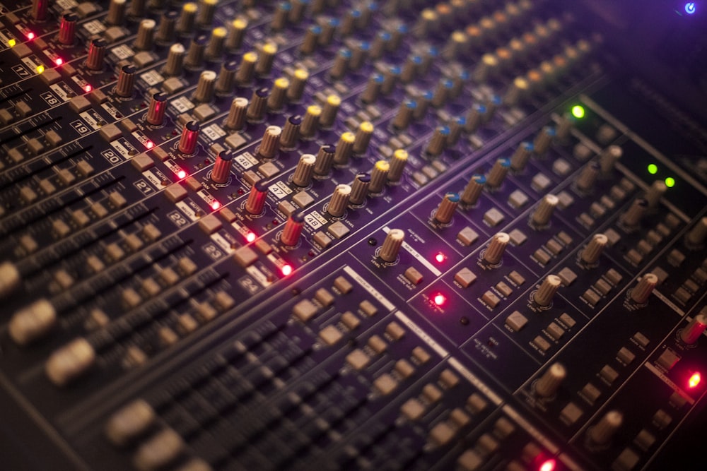 selective focus photography of audio mixer