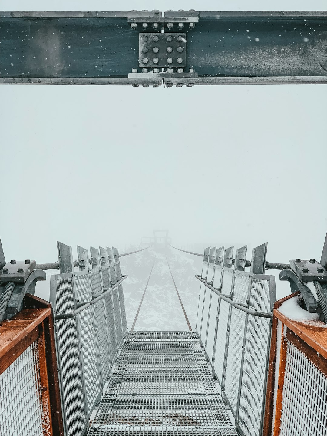 bridge covered in fog