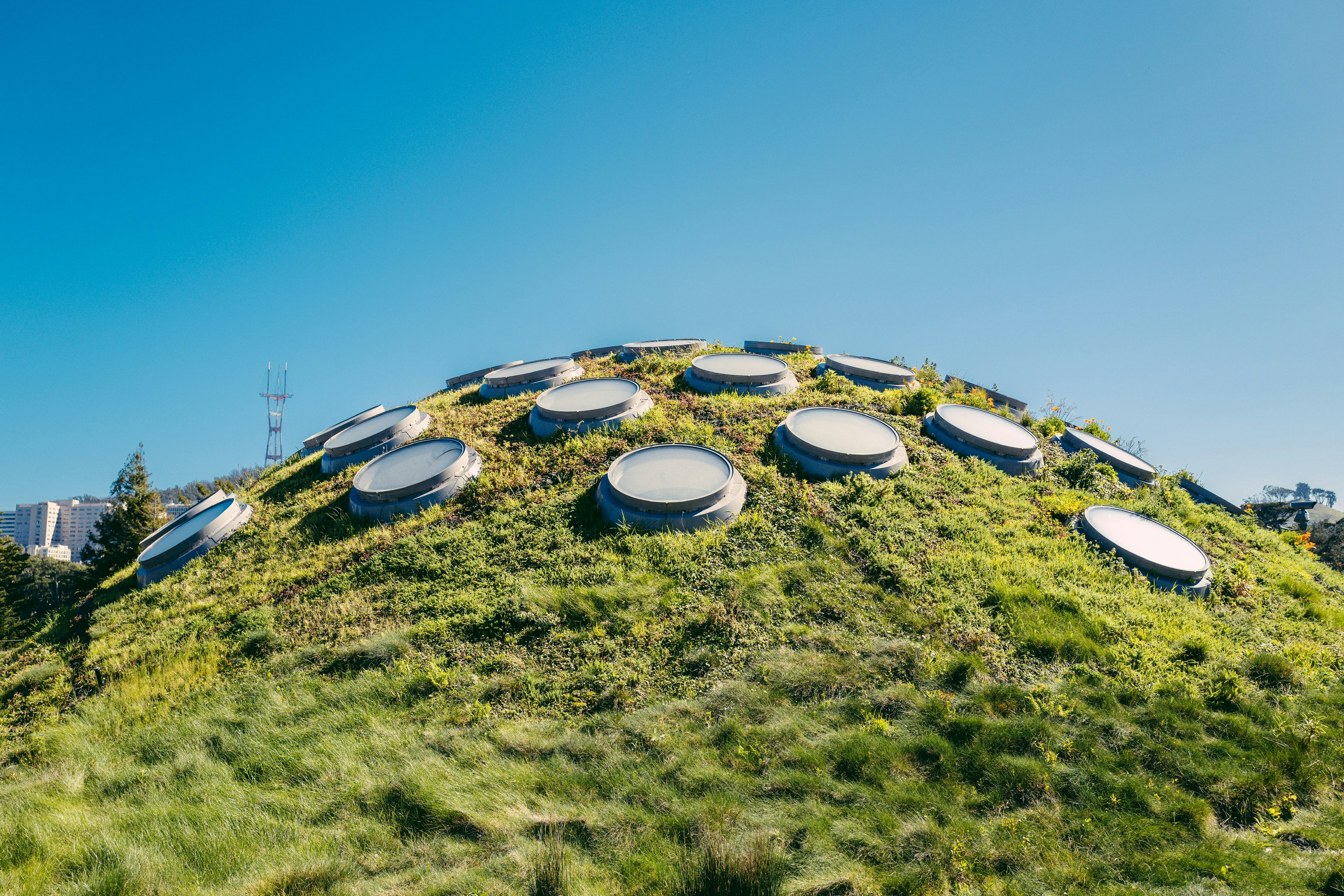 several round lids on hill