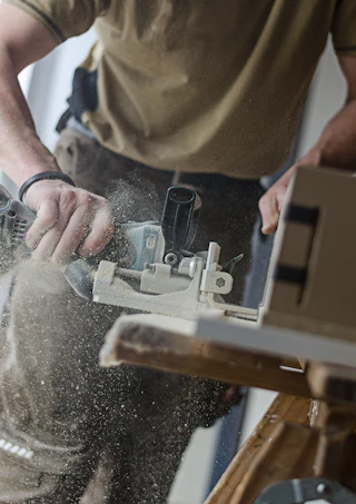 A cutter opening a joint in a piece. Stock image, placeholder.