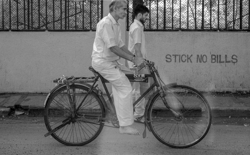 grayscale photography of two man