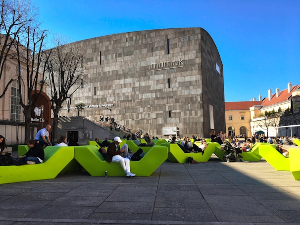 Contemporary urban plaza with green spaces and minimalist benches